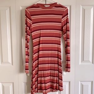 Stripped form fitting long sleeve dress